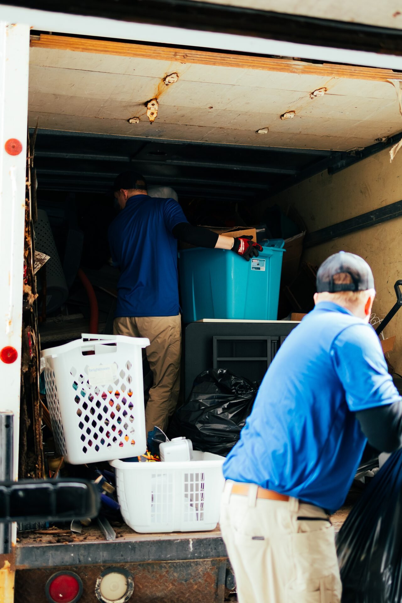 AP Brothers crew loading items for removal