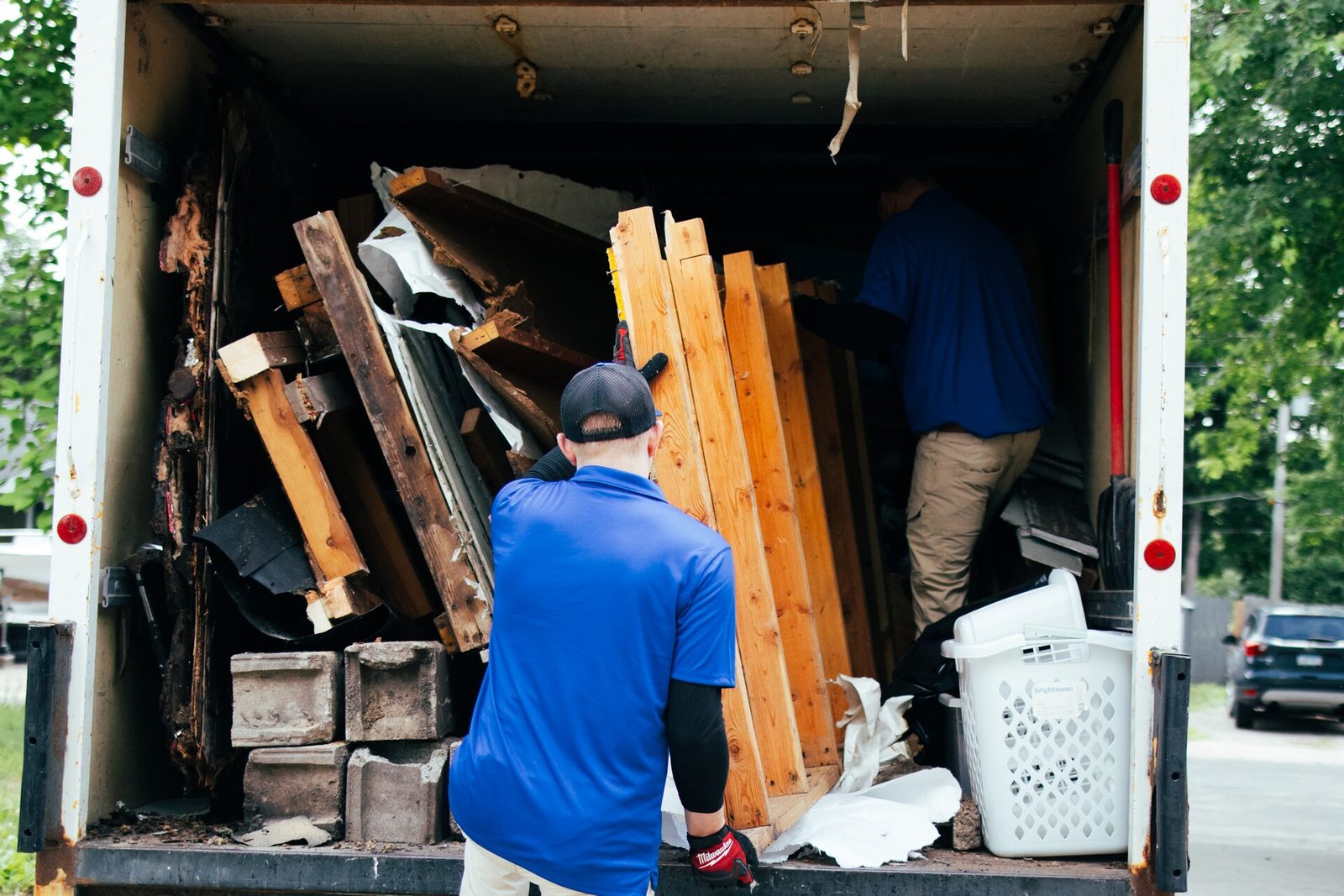 Box truck loaded with junk and debris