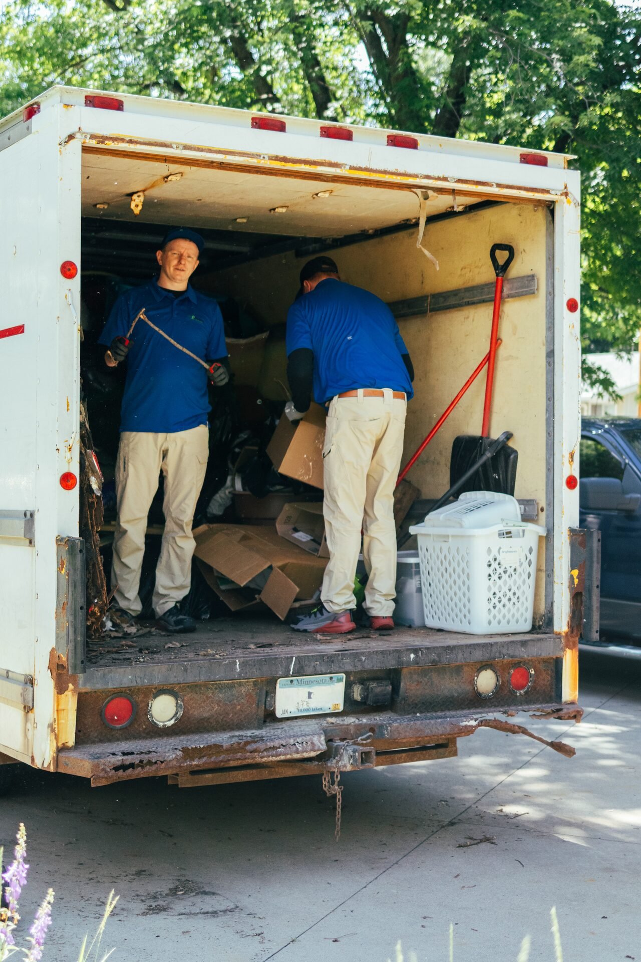 Loading a junk removal truck